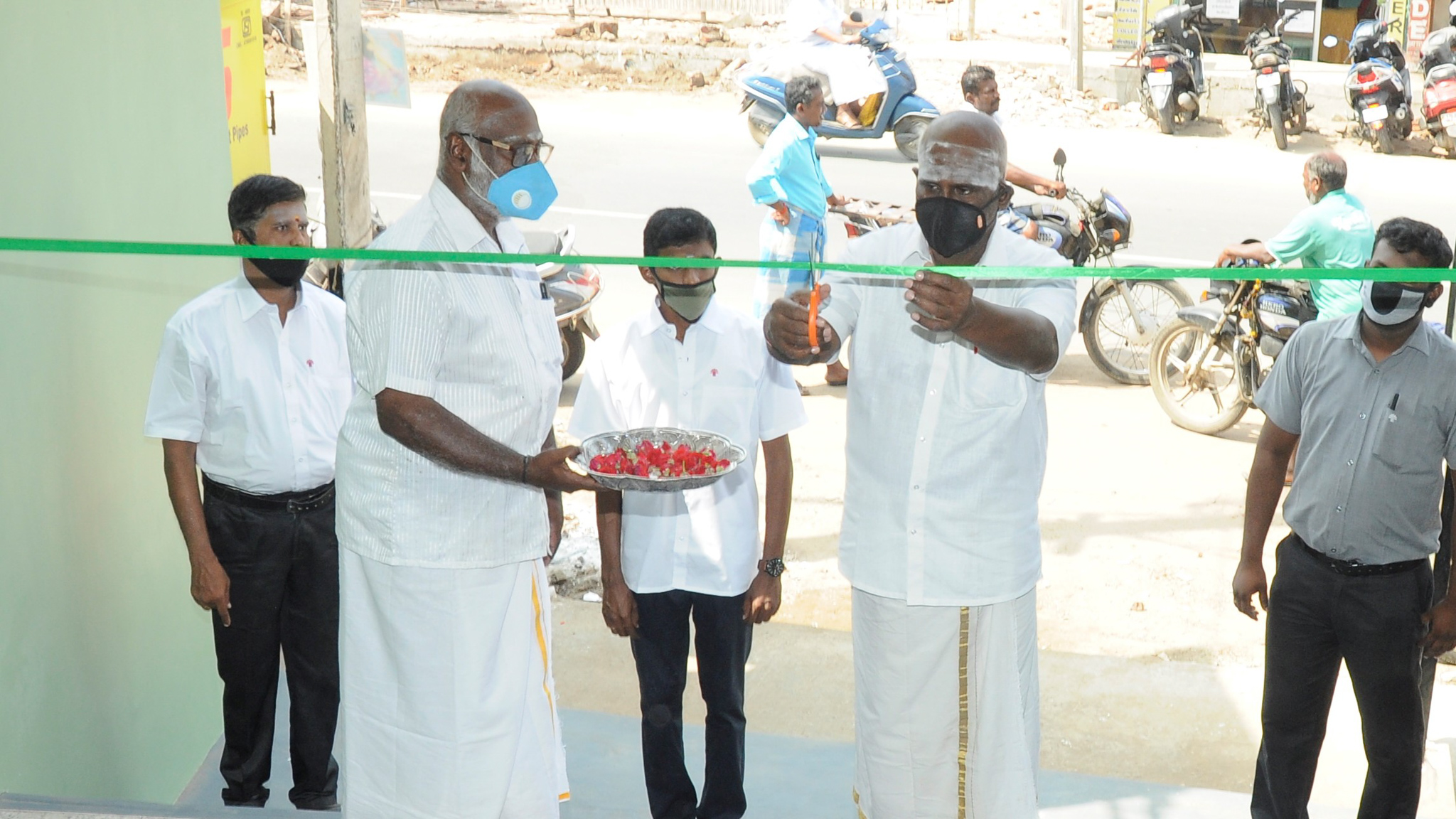 Taro Pumps dealer Dhamu Suppliers ribbon cutting