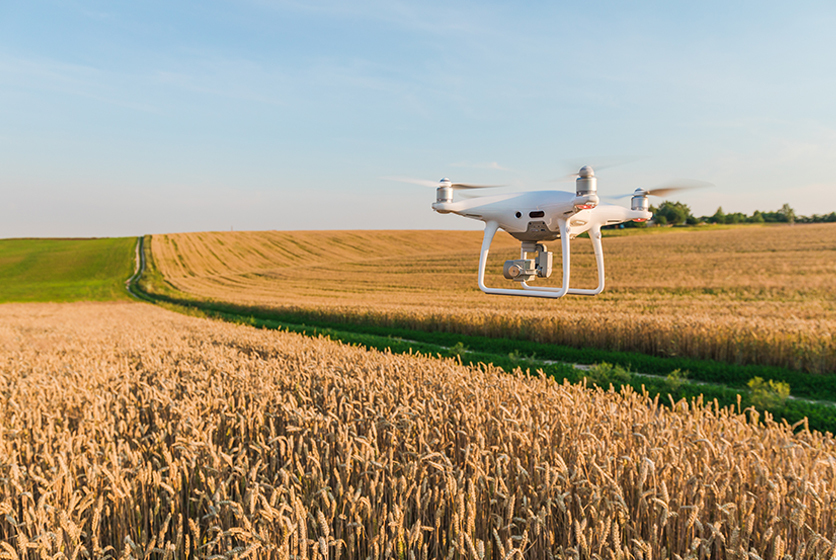 Drone flying over a farm land