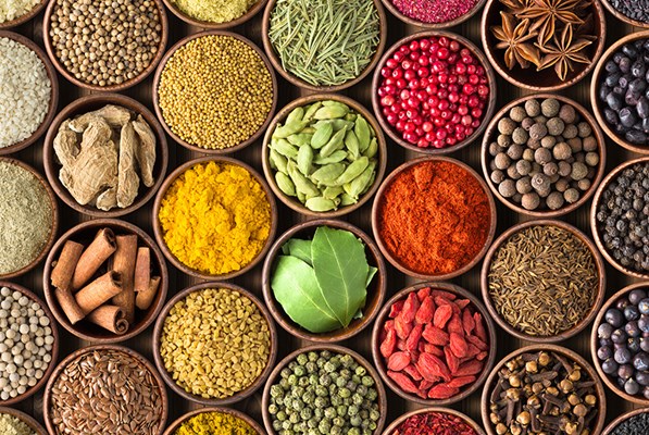 Several bowls filled with various spices