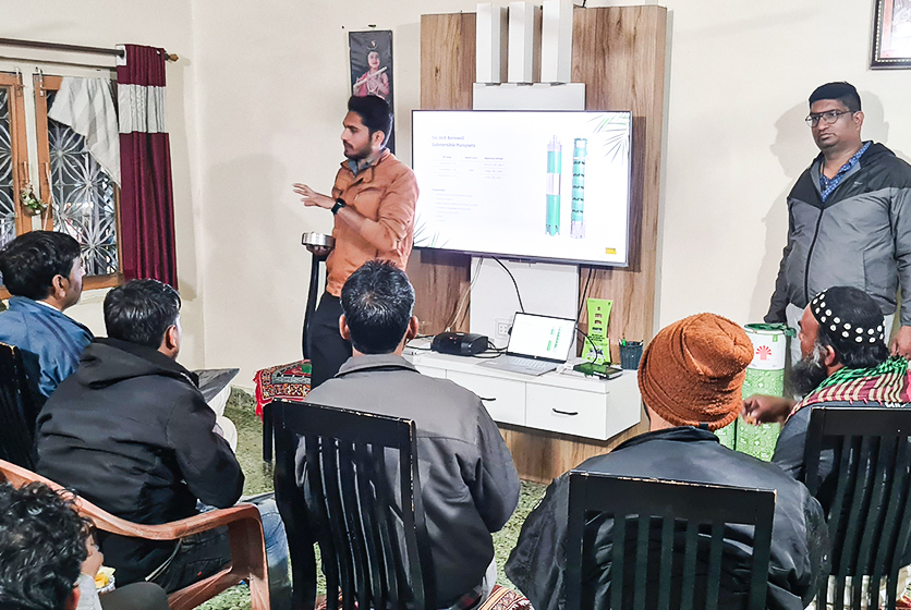 Taro Pumps sales manager explaining Taro Pumps products to mechanics