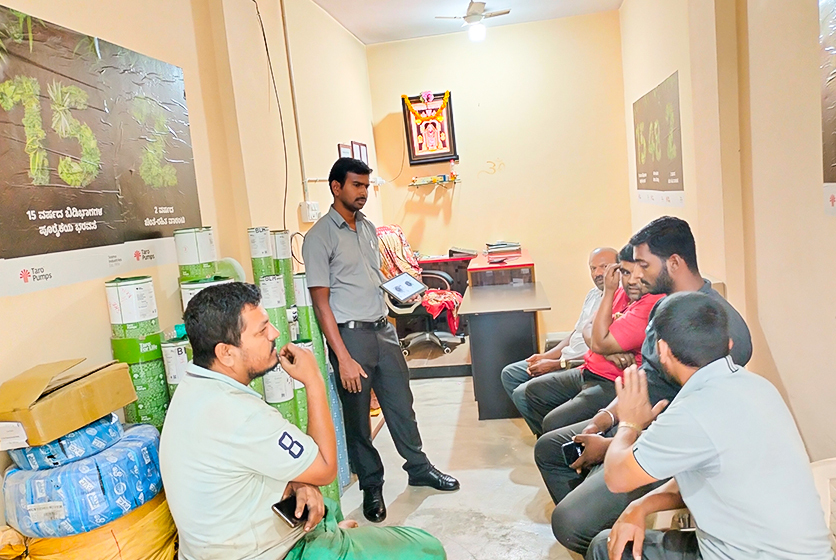 Taro Pumps sales manager explaining Taro Pumps products to mechanics