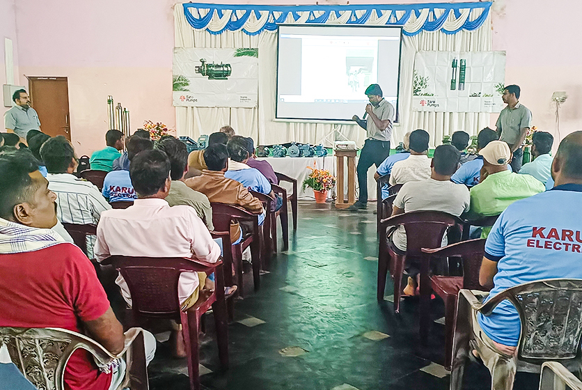 Taro Pumps sales manager explaining Taro Pumps products to mechanics