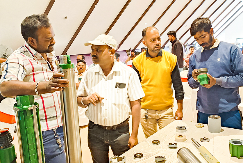 Taro Pumps sales manager explaining Taro Pumps products to mechanics