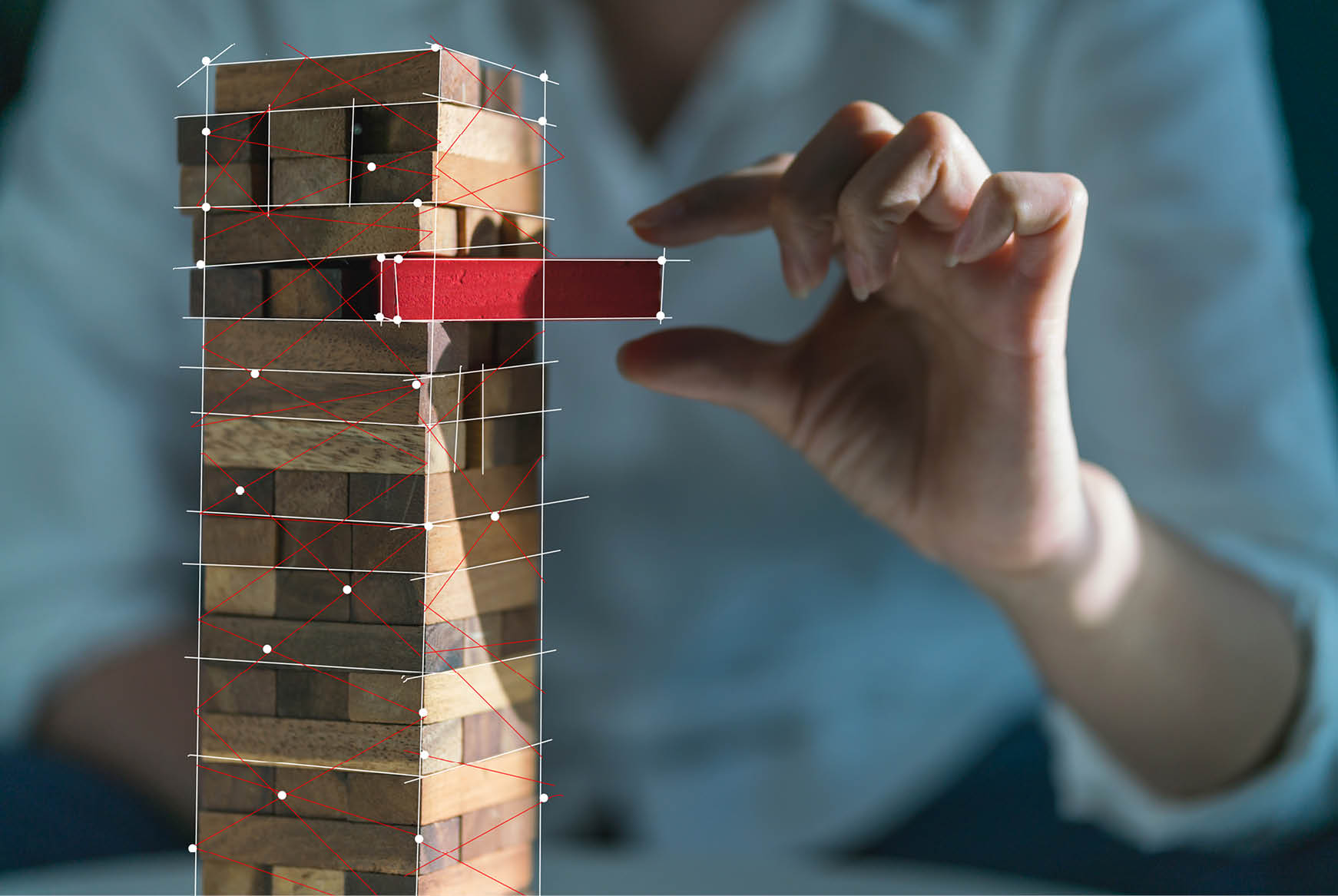 Person with jenga blocks