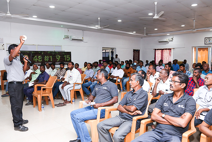 Taro Pumps sales manager explaining Taro Pumps products to mechanics