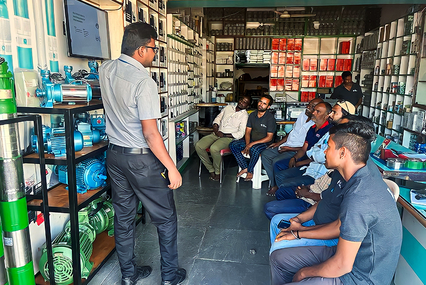 Taro Pumps manager explaining Taro Pumps products to mechanics