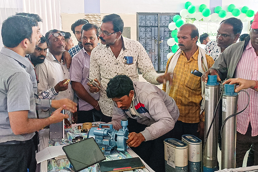 Taro Pumps manager explaining Taro Pumps products to mechanics