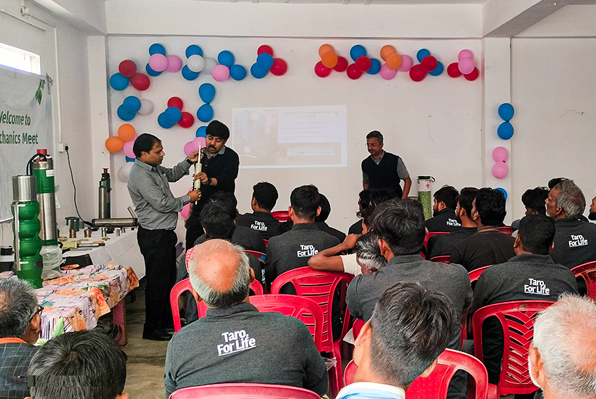 Taro Pumps manager explaining Taro Pumps products to mechanics
