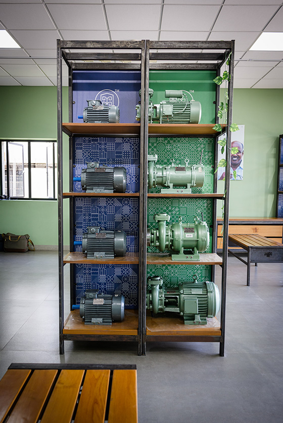 Taro Pumps store interior showing rack of pumps sets