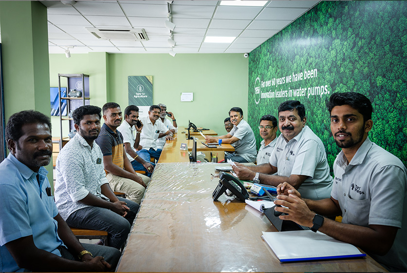 Employees and customers at the Taro Pumps store