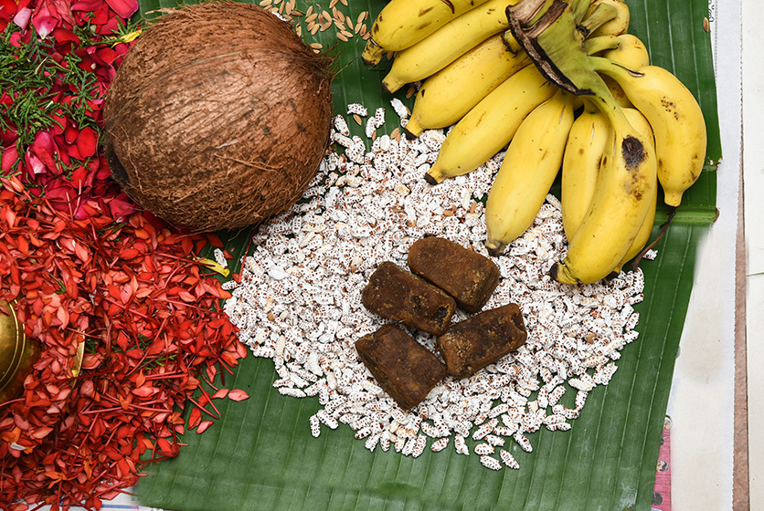 Festival offerings with banana, flowers and grains