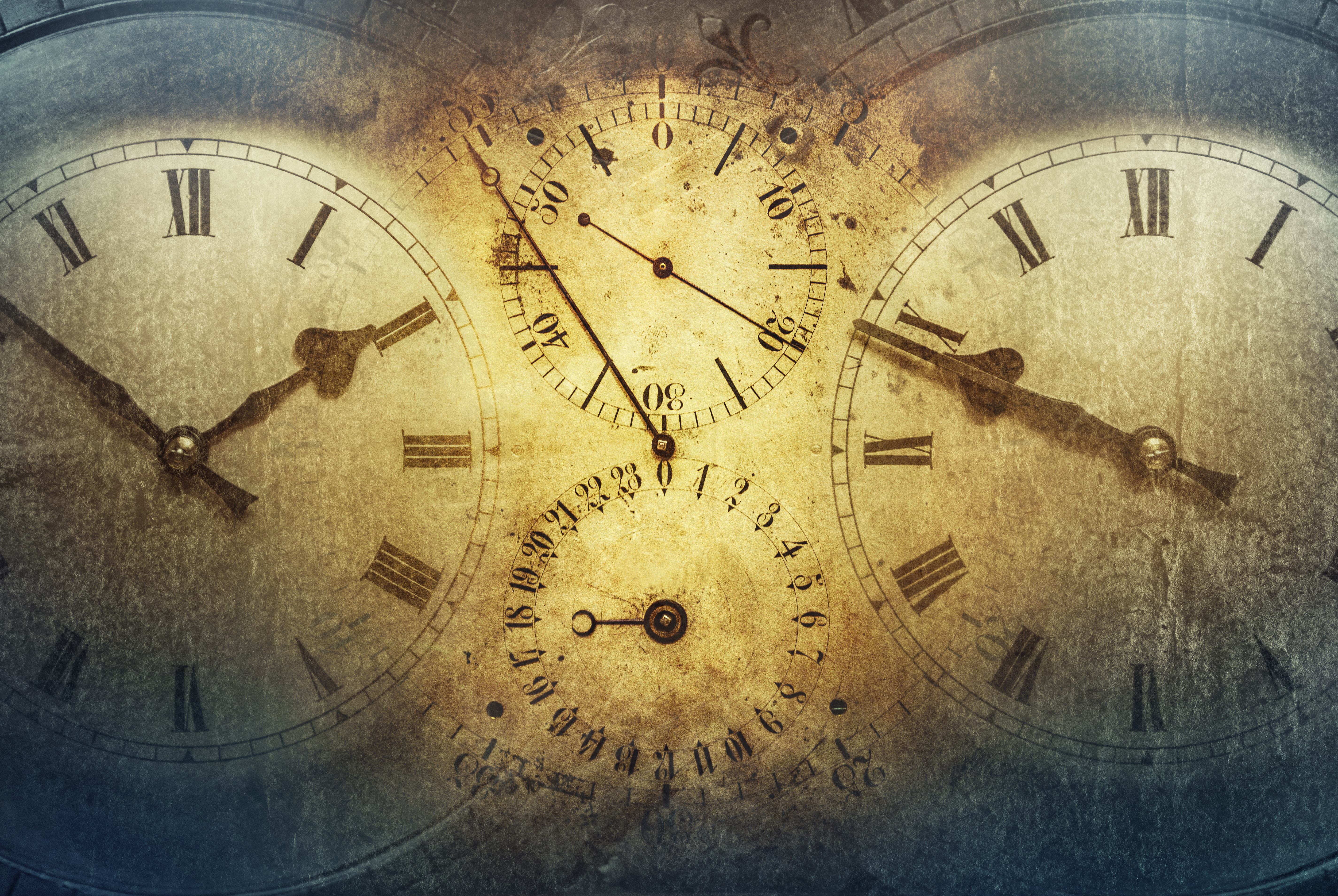 Dials of old antique classic clocks on a vintage paper background.